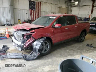 2021 Honda Ridgeline RTL-E with VIN 5FPYK3F76MB018004, listed as a Copart auction lot 48556105 with 15,544 mi miles and Salvage title. Bid and sale history available at DreamBid. Image 1.
