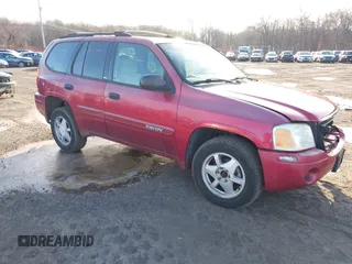 2002 GMC Envoy SLT with VIN 1GKDT13S222517064, listed as a IAAI auction lot 41590087 with 312,164 mi miles. Bid and sale history available at carsss.com. Image 1.