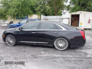 2014 Cadillac XTS Luxury z VIN 2G61N5S38E9292684, wystawiony jako IAAI lot #41842596 z przebiegiem 130 318 mil mil oraz . Historia ofert i sprzedaży dostępna na DreamBid. Obrazek 14.