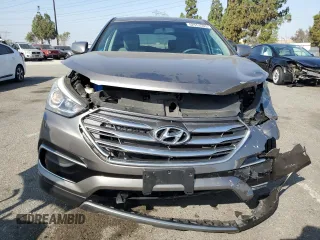 2017 Hyundai Santa Fe 2.4L with VIN 5XYZT3LB0HG392609, listed as a Copart auction lot 62553505 with 69,774 mi miles and Salvage title. Bid and sale history available at DreamBid. Image 5.