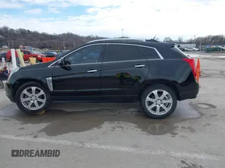 2013 Cadillac SRX Performance Collection with VIN 3GYFNHE34DS595277, listed as a IAAI auction lot 41618126 with 118,141 mi miles. Bid and sale history available at carsss.com. Image 14.