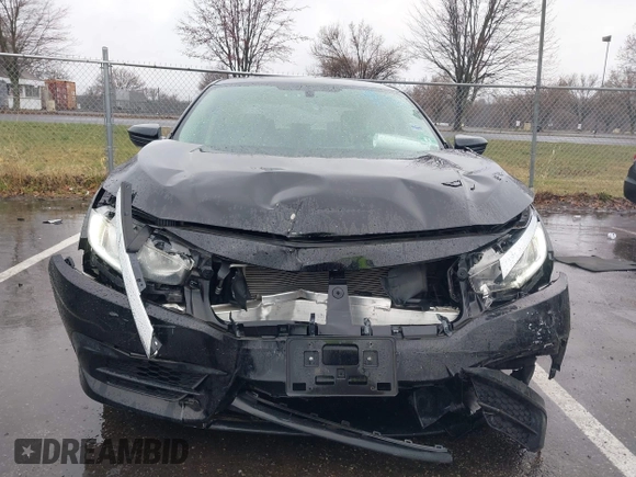 2018 Honda Civic LX with VIN 2HGFC2F54JH548274, listed as a IAAI auction lot 41864457 with 60,905 mi miles and . Bid and sale history available at DreamBid. Image 6.