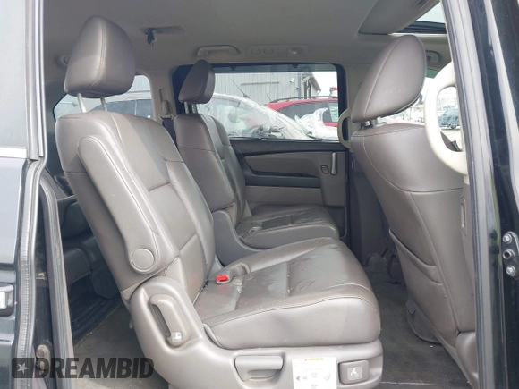 2012 Honda Odyssey EX-L with VIN 5FNRL5H63CB070361, listed as a IAAI auction lot 42025024 with 152,258 mi miles and . Bid and sale history available at carsss.com. Image 8.
