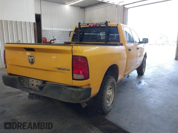 2018 Ram 2500 Tradesman with VIN 3C6TR5CTXJG215458, listed as a IAAI auction lot 42516941 with 95,718 mi miles and . Bid and sale history available at DreamBid. Image 4.