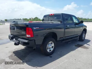 2016 Ram 2500 SLT with VIN 3C6TR5DT0GG268340, listed as a IAAI auction lot 42492262 with 117,230 mi miles and . Bid and sale history available at DreamBid. Image 4.