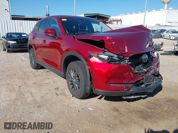 2020 Mazda CX-5 Touring with VIN JM3KFACM1L0756864, listed as a IAAI auction lot 41761131 with 16,646 mi miles and . Bid and sale history available at carsss.com. Image 1.