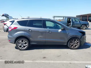 2014 Ford Escape Titanium с VIN 1FMCU0J95EUC22897, выставлен на аукционе IAAI как лот 42204135 с пробегом 144 534 миль миль и . История ставок и продаж доступна на DreamBid. Изображение 14.