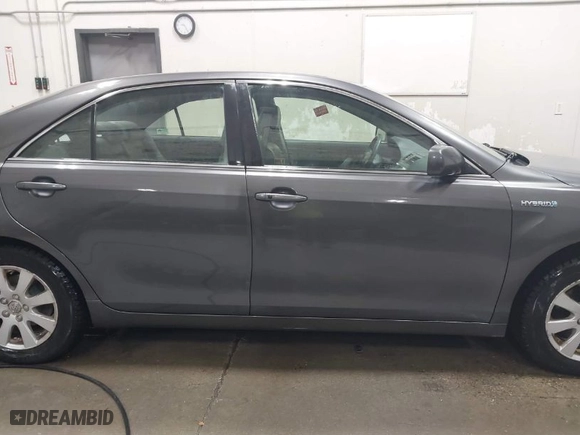 2009 Toyota Camry Hybrid with VIN JTNBB46K993050762, listed as a IAAI auction lot 41555541 with 156,668 mi miles. Bid and sale history available at carsss.com. Image 14.