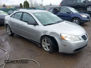 2006 Pontiac G6 6-Cyl with VIN 1G2ZG558464289212, listed as a IAAI auction lot 41994843 with 126,502 mi miles. Bid and sale history available at carsss.com. Image 1.