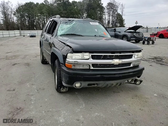 2003 Chevrolet Tahoe Z71 with VIN 1GNEK13T03R124255, listed as a Copart auction lot 42002945 with 205,965 mi miles and Salvage Title. Bid and sale history available at carsss.com. Image 12.