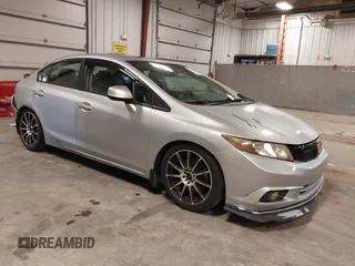 2012 Honda Civic Si z VIN 2HGFB6E52CH703113, wystawiony jako IAAI lot #41861980 z przebiegiem 113 834 mil mil oraz . Historia ofert i sprzedaży dostępna na DreamBid. Obrazek 1.