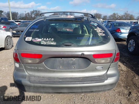 2002 Ford Taurus z VIN 1FAHP59SX2G137396, wystawiony jako IAAI lot #41661425 z przebiegiem 155 789 mil mil oraz . Historia ofert i sprzedaży dostępna na DreamBid. Obrazek 17.