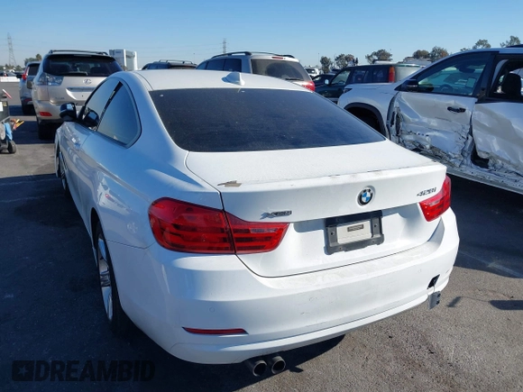 2014 BMW 4 Series 428i xDrive with VIN WBA3N5C56EF716566, listed as a IAAI auction lot 41245322 with 72,252 mi miles and . Bid and sale history available at DreamBid. Image 3.