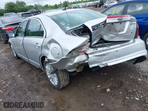 2011 Ford Fusion Hybrid with VIN 3FADP0L33BR126557, listed as a IAAI auction lot 42523235 with 179,867 mi miles and . Bid and sale history available at DreamBid. Image 3.
