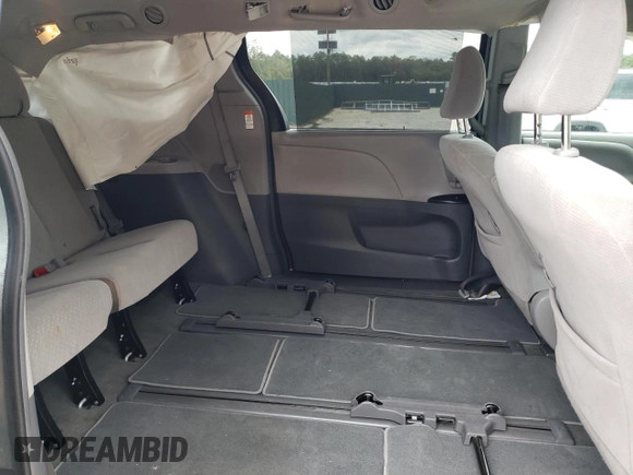 2019 Toyota Sienna LE with VIN 5TDJZ3DC6KS210862, listed as a Copart auction lot 73302064 with 113,768 mi miles and Salvage Title. Bid and sale history available at carsss.com. Image 11.