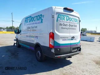 2023 Ford Transit Cargo with VIN 1FTBR1C89PKC07197, listed as a IAAI auction lot 42228682 with 39,306 mi miles and . Bid and sale history available at DreamBid. Image 3.