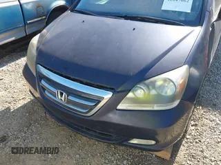 2007 Honda Odyssey Touring with VIN 5FNRL38807B023395, listed as a IAAI auction lot 42047062 with 240,552 mi miles. Bid and sale history available at carsss.com. Image 6.