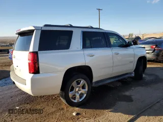 2015 Chevrolet Tahoe LT with VIN 1GNSCBKC2FR738042, listed as a Copart auction lot 84856214 with 144,325 mi miles and Salvage title. Bid and sale history available at DreamBid. Image 3.