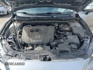 2015 Mazda 3 i Touring with VIN 3MZBM1L77FM138326, listed as a IAAI auction lot 41839685 with 97,506 mi miles and . Bid and sale history available at carsss.com. Image 10.