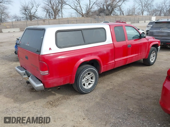 2003 Dodge Dakota SLT with VIN 1D7HL42X43S247404, listed as a IAAI auction lot 41685036 with 95,054 mi miles. Bid and sale history available at carsss.com. Image 4.