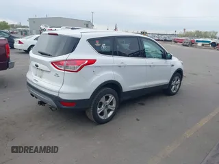 2013 Ford Escape SE with VIN 1FMCU9G98DUD55700, listed as a IAAI auction lot 42035531 with 189,010 mi miles. Bid and sale history available at carsss.com. Image 4.