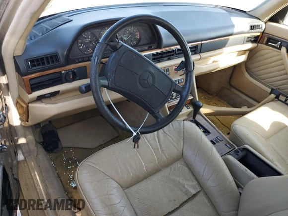 1989 Mercedes-Benz 560 with VIN WDBCA39E8KA469603, listed as a Copart auction lot 82986634 with 81,490 mi miles and Clean Title. Bid and sale history available at DreamBid. Image 8.