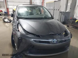 2021 Toyota Prius L Eco with VIN JTDKAMFU9M3132587, listed as a IAAI auction lot 41637275 with 84,203 mi miles. Bid and sale history available at carsss.com. Image 12.