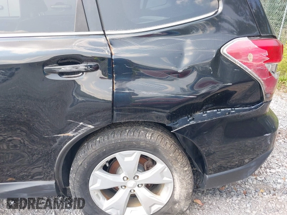 2014 Subaru Forester 2.5i Limited with VIN JF2SJAJC9EH517196, listed as a IAAI auction lot 31343919 with 71,396 mi miles. Bid and sale history available at carsss.com. Image 17.