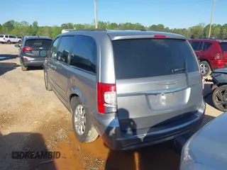 2015 Chrysler Town & Country Touring with VIN 2C4RC1BG9FR715307, listed as a IAAI auction lot 41988281 with 164,167 mi miles. Bid and sale history available at carsss.com. Image 3.