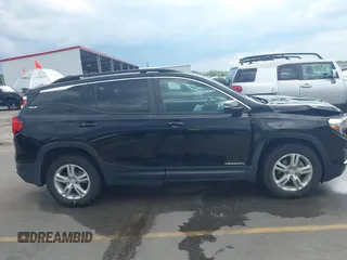 2021 GMC Terrain SLE z VIN 3GKALTEV5ML345992, wystawiony jako IAAI lot #42467280 z przebiegiem 123 704 mil mil oraz . Historia ofert i sprzedaży dostępna na DreamBid. Obrazek 13.