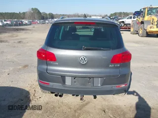 2012 Volkswagen Tiguan SE with VIN WVGAV7AX5CW000275, listed as a IAAI auction lot 41789246 with 123,618 mi miles and . Bid and sale history available at DreamBid. Image 16.