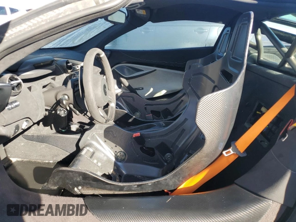2021 McLaren 765LT z VIN SBM14RCAXMW765454, wystawiony jako Copart lot #75086054 z przebiegiem Nie podano mil oraz Nie do naprawy. Historia ofert i sprzedaży dostępna na DreamBid. Obrazek 7.