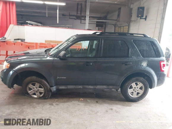 2009 Ford Escape Hybrid with VIN 1FMCU49339KB19700, listed as a IAAI auction lot 42253749 with 169,299 mi miles and . Bid and sale history available at DreamBid. Image 14.
