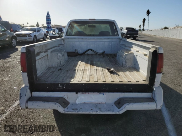 1995 GMC Sonoma z VIN 1GTCS14Z5S8536775, wystawiony jako Copart lot #77086374 z przebiegiem 70 419 mil mil oraz Tytuł czysty. Historia ofert i sprzedaży dostępna na DreamBid. Obrazek 6.