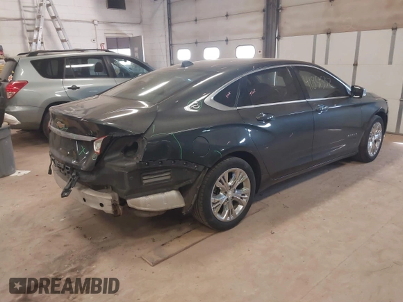 2014 Chevrolet Impala LT with VIN 1G1125S38EU115473, listed as a IAAI auction lot 41851532 with 167,513 mi miles and . Bid and sale history available at DreamBid. Image 4.