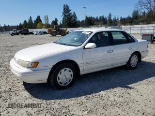 1994 Ford Taurus GL z VIN 1FALP52U5RG230682, wystawiony jako Copart lot #53547945 z przebiegiem 87 044 mil mil oraz Czysty tytuł • Clean title. Historia ofert i sprzedaży dostępna na DreamBid. Obrazek 1.