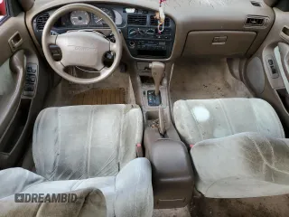 1993 Toyota Camry LE with VIN 4T1SK12E8PU240803, listed as a Copart auction lot 76663004 with 214,911 mi miles and Salvage Title. Bid and sale history available at carsss.com. Image 8.