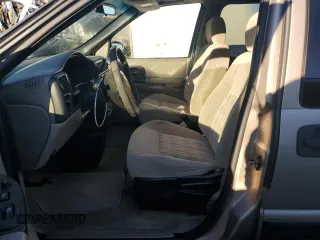 2003 Chevrolet Venture 1SA z VIN 1GNDX03E23D302043, wystawiony jako Copart lot #74490134 z przebiegiem 145 181 mil mil oraz Tytuł czysty. Historia ofert i sprzedaży dostępna na DreamBid. Obrazek 7.