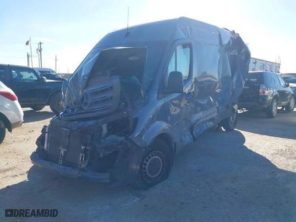 2019 Mercedes-Benz Sprinter Cargo Van with VIN WD4PF1CD4KP128193, listed as a IAAI auction lot 41150385 with 100,817 mi miles. Bid and sale history available at carsss.com. Image 2.
