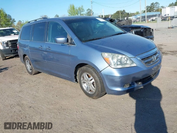 2005 Honda Odyssey EX-L with VIN 5FNRL38605B037065, listed as a IAAI auction lot 42042666 with 228,908 mi miles. Bid and sale history available at carsss.com. Image 1.