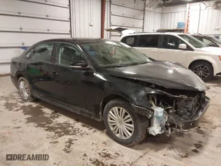 2014 Volkswagen Passat Wolfsburg Ed with VIN 1VWAT7A33EC108340, listed as a IAAI auction lot 41240386 with 139,908 mi miles. Bid and sale history available at carsss.com. Image 1.