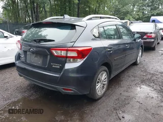 2017 Subaru Impreza Premium with VIN 4S3GTAB68H3712411, listed as a IAAI auction lot 42503350 with 206,967 mi miles and . Bid and sale history available at DreamBid. Image 4.