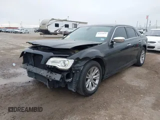 2016 Chrysler 300 with VIN 2C3CCAEG5GH333935, listed as a IAAI auction lot 41433834 with 131,524 mi miles. Bid and sale history available at carsss.com. Image 2.