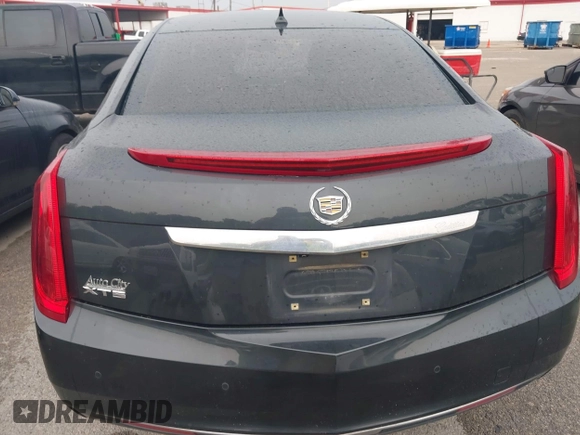 2014 Cadillac XTS z VIN 2G61L5S32E9326141, wystawiony jako IAAI lot #42300854 z przebiegiem 200 284 mil mil oraz . Historia ofert i sprzedaży dostępna na DreamBid. Obrazek 16.