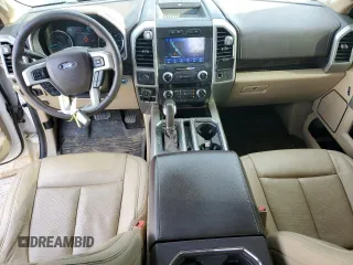 2019 Ford F-150 XL with VIN 1FTEW1E53KFC64165, listed as a Copart auction lot 50802595 with 148,546 mi miles and Salvage Title. Bid and sale history available at carsss.com. Image 8.