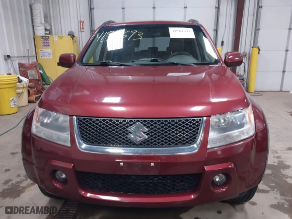 2006 Suzuki Grand Vitara Luxury with VIN JS3TD947264106126, listed as a IAAI auction lot 41961693 with 146,105 mi miles. Bid and sale history available at carsss.com. Image 12.