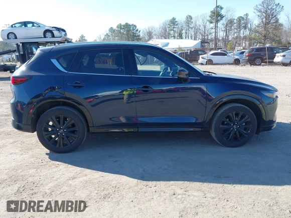 2022 Mazda CX-5 2.5 Turbo with VIN JM3KFBAY4N0534690, listed as a IAAI auction lot 41716988 with 23,910 mi miles and . Bid and sale history available at carsss.com. Image 13.