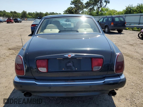 2001 Bentley Arnage with VIN SCBLC31E31CX05992, listed as a Copart auction lot 60462974 with 253,028 mi miles and Salvage Title. Bid and sale history available at DreamBid. Image 6.
