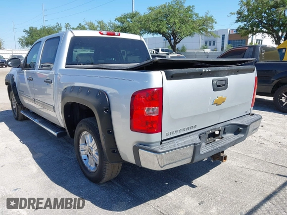 2013 Chevrolet Silverado 1500 LT with VIN 3GCPKSE71DG203443, listed as a IAAI auction lot 42033447 with 128,904 mi miles. Bid and sale history available at carsss.com. Image 3.