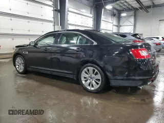 2012 Ford Taurus Limited с VIN 1FAHP2FW7CG100698, выставлен на аукционе Copart как лот 59015515 с пробегом 190 295 миль миль и Списание • Salvage title. История ставок и продаж доступна на DreamBid. Изображение 2.